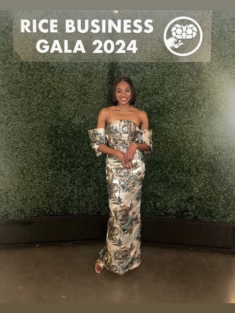 A customer at a gala wearing her unit