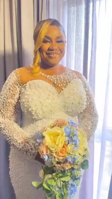 A DLQ bride in her wedding unit